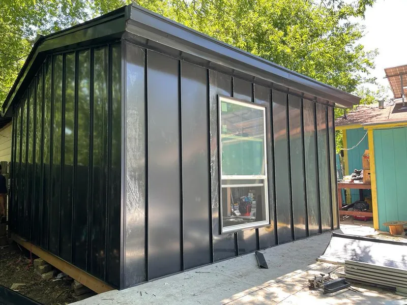 Black standing seam metal wall panels for Metal Roof Installation in Hillsdale