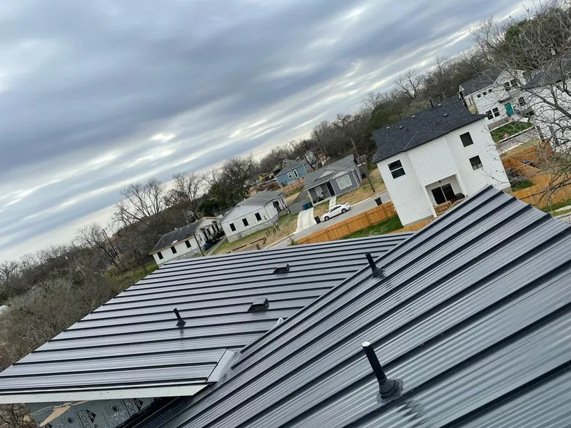 Standing seam metal roof panels with vents for Skylight Repair in Hillsdale